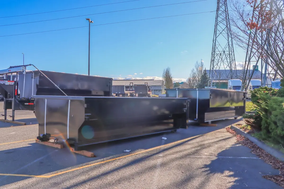 Roll-off dumpster ready for waste disposal at job site for Construction Dumpster Rental in New London
